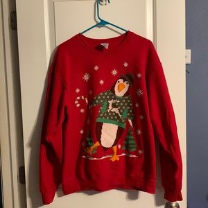 Festive penguin sweatshirt.